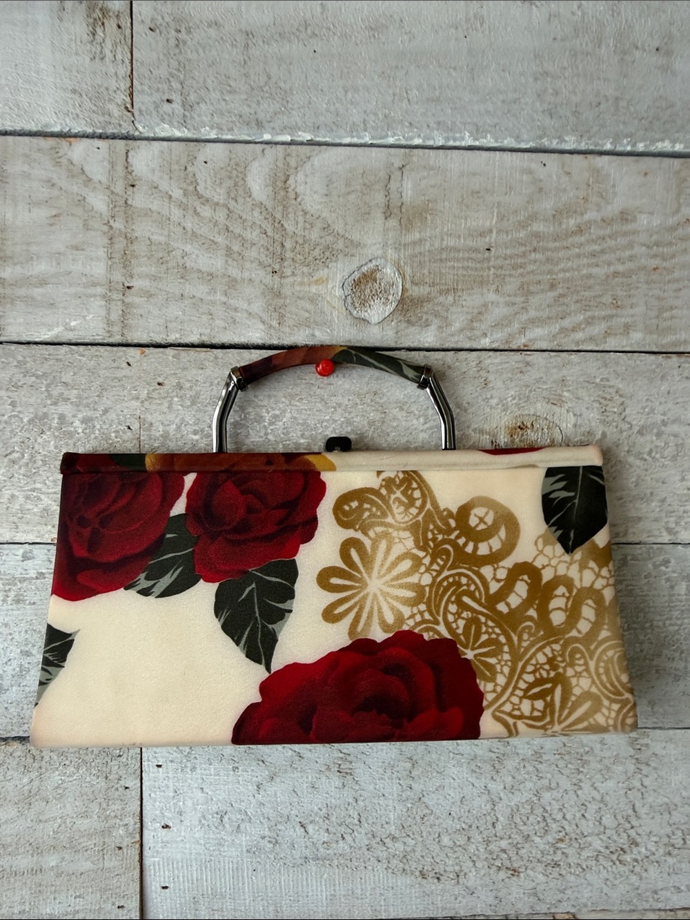 Jeanne Lottie hardshell floral clutch gunmetal hardware